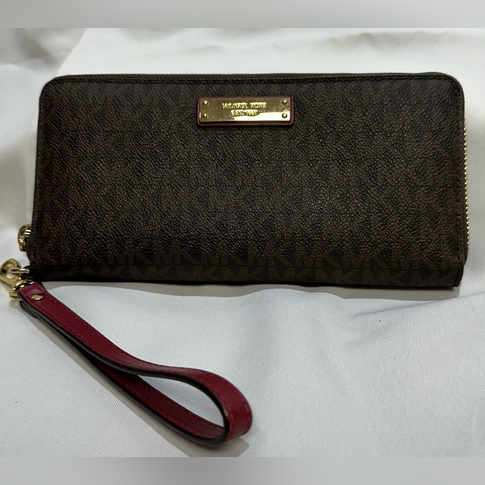 Michael Kors travel Continental wristlet wallet.